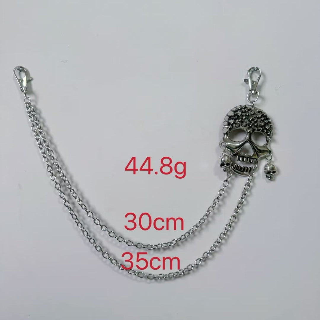 Edgy women's chain belt, featuring gothic cross pendants, a bold punk fashion accessory.