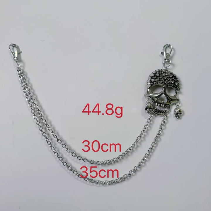 Edgy women's chain belt, featuring gothic cross pendants, a bold punk fashion accessory.