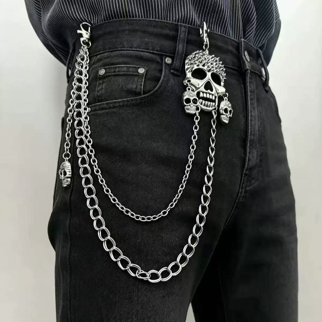 Stylish women's chain belt with intricate cross pendants, adding an edgy touch to any outfit.