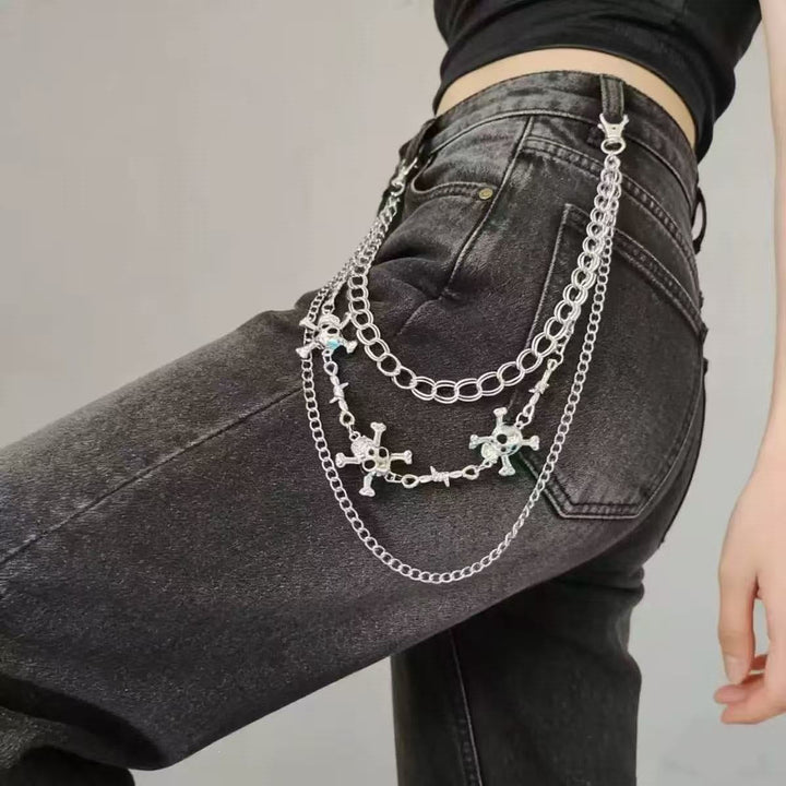 Women's waist or hip chain belt with gothic cross pendants, a trendy and edgy fashion statement.