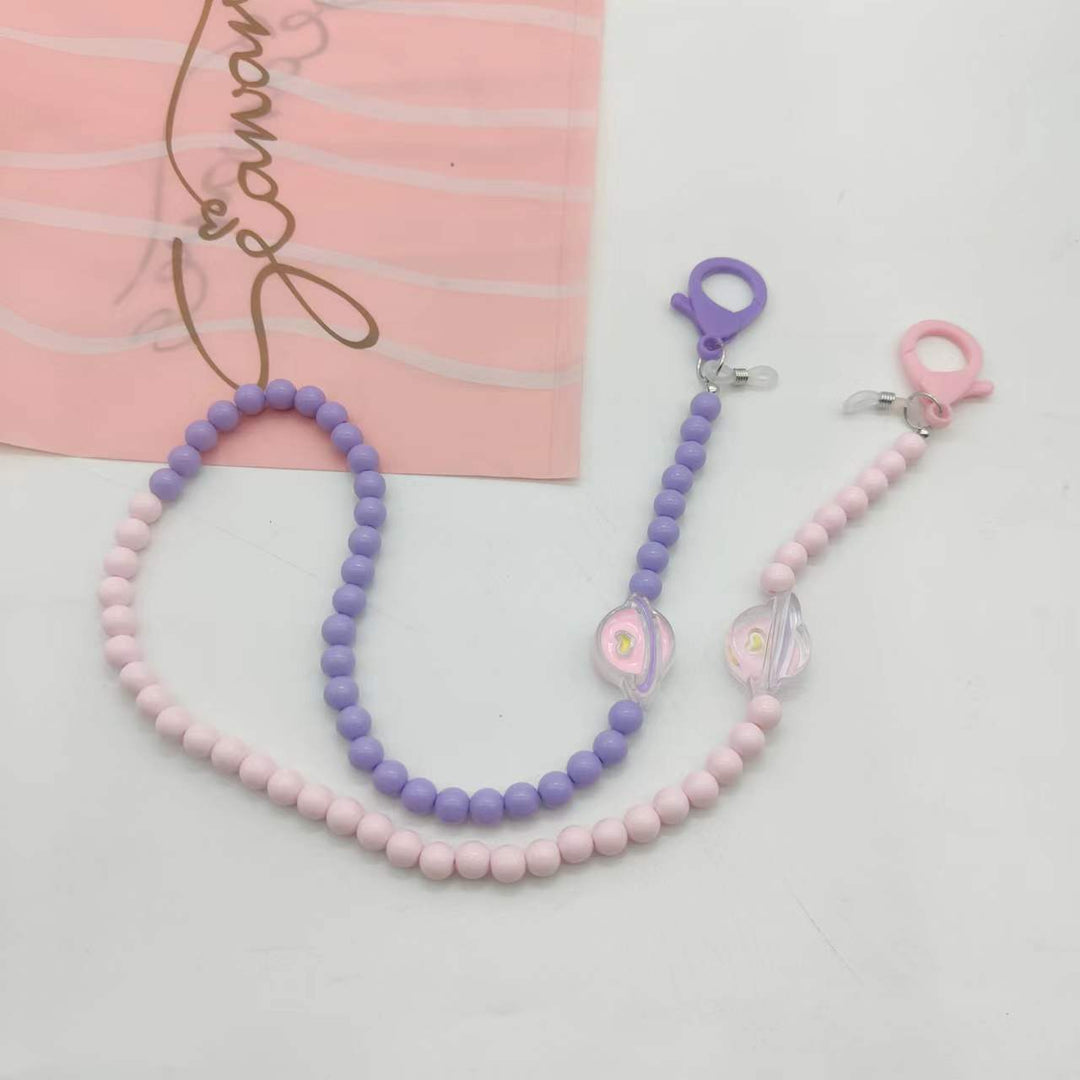 Women's fashionable lilac eyewear holder lanyard, a stylish and practical glasses chain neck strap accessory.