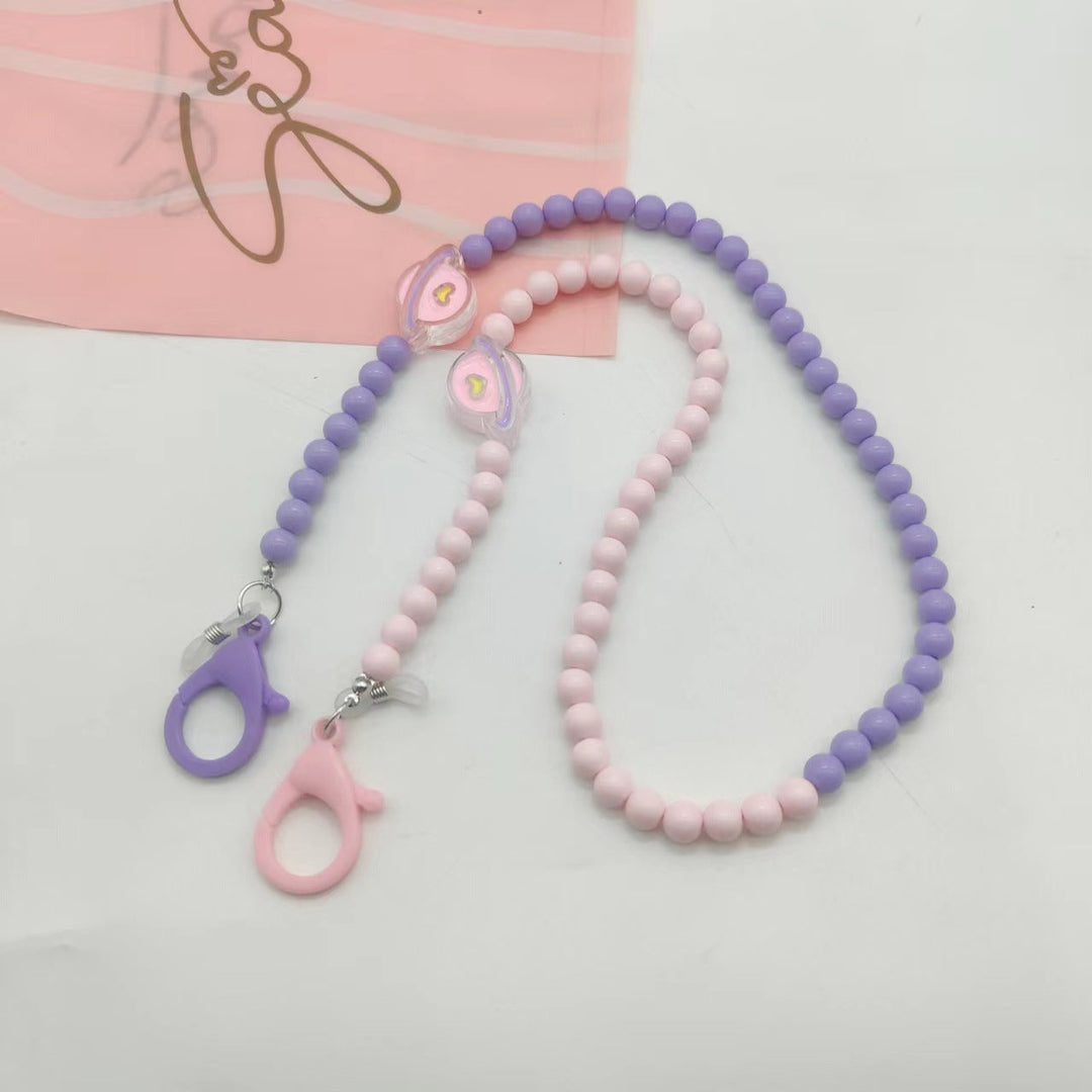 Practical women's eyewear lanyard in lilac, a fashionable glasses chain neck strap holder. Great stylish accessory.