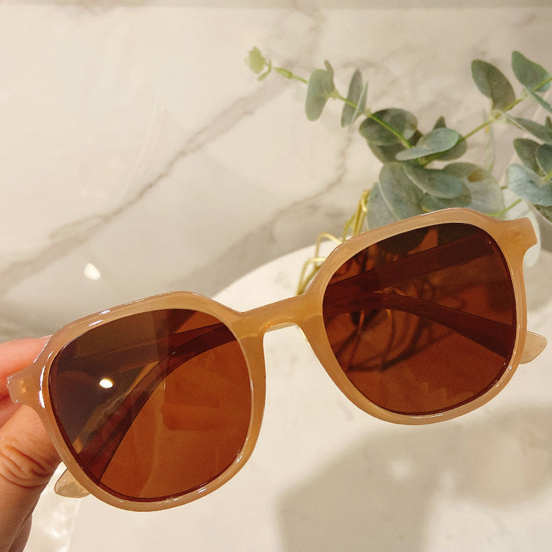 Modern women's oversized square eyewear, trendy and chic, perfect for summer fashion & eye protection.