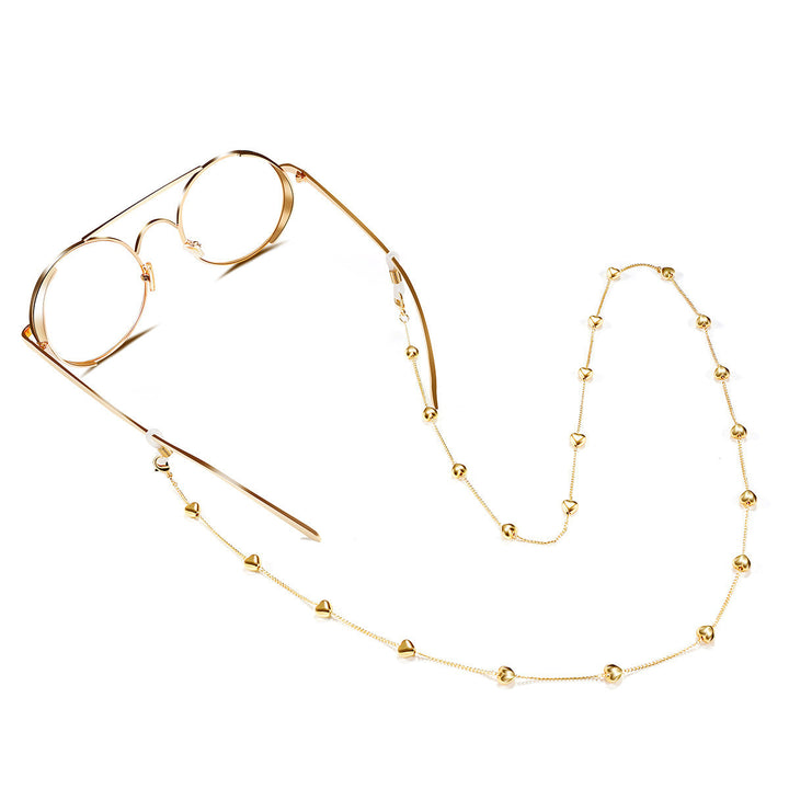 Women's fashionable silver glasses strap with cute heart pendants. Secure eyewear accessory & stylish gift for her.