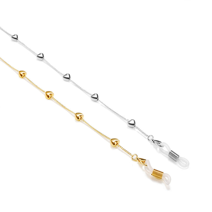 Secure & trendy women's glasses strap with delicate heart charms. Perfect fashion accessory to hold your eyewear.