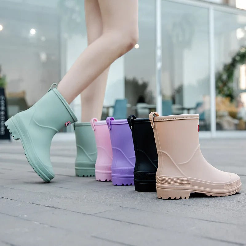 Women's fashionable waterproof rain boots for wet weather.
