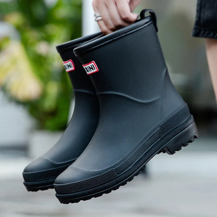 Women's waterproof rain boots with durable non-slip sole, ensuring comfort & safety in rain.