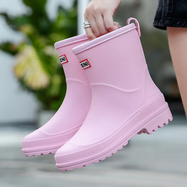 All-weather women's waterproof rain boots, comfortable & non-slip for outdoor activities.