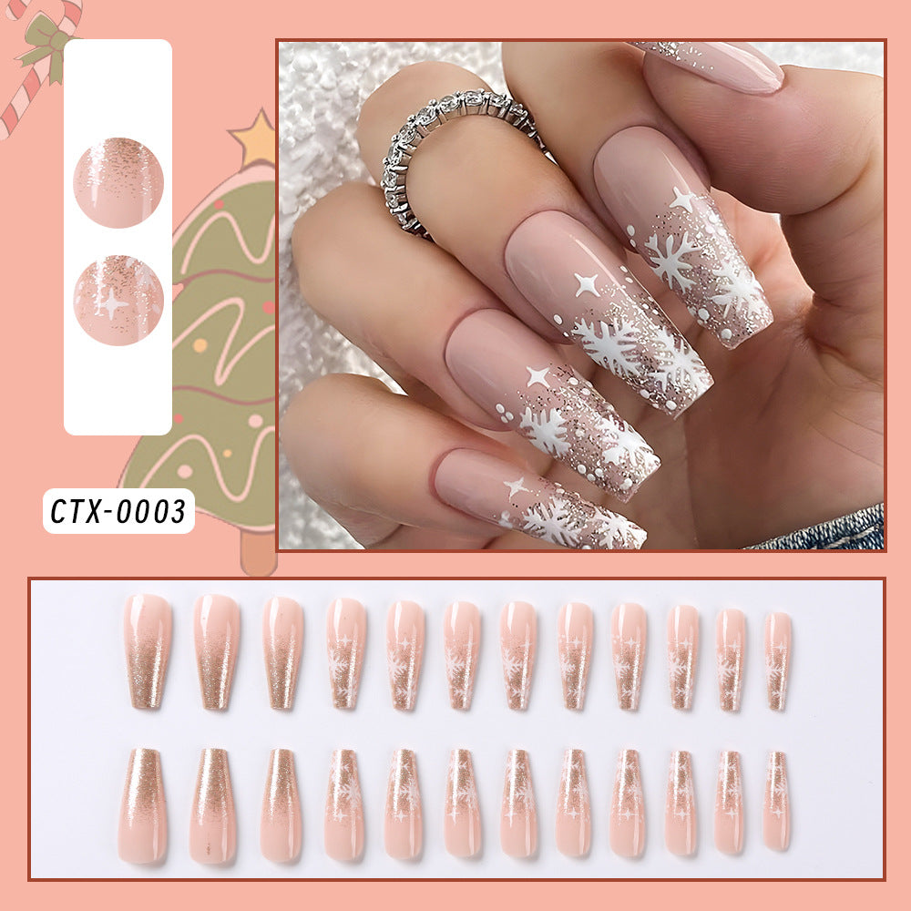 Elegant women's festive candy cane press-on nails. Reusable holiday fake nails, perfect for Christmas parties.