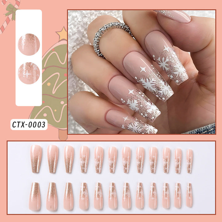 Sparkling glitter snowflake press-on nails for women. Festive false nails, ideal for holiday parties & winter beauty.