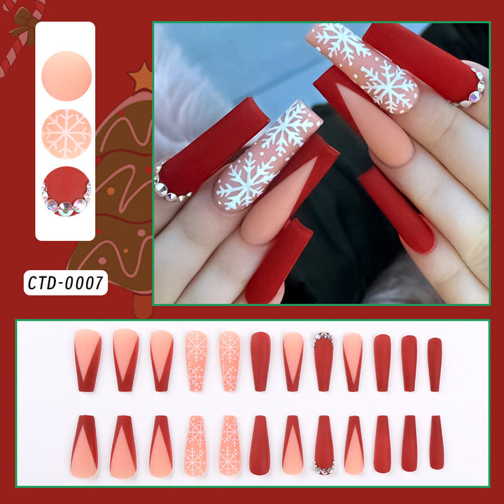 Winter beauty press-on nail set for women, perfect for a festive holiday manicure. Easy apply, reusable.