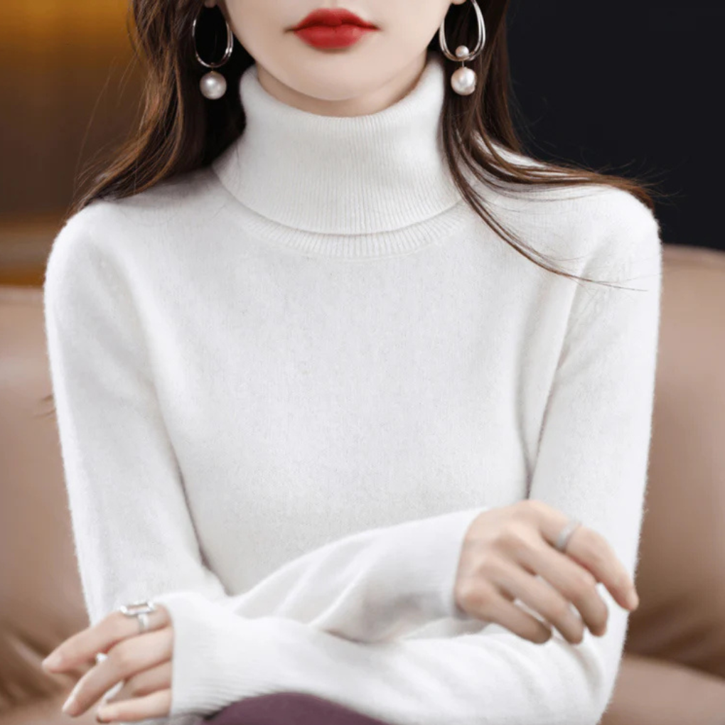 Elegant women's fine-knit turtleneck. Versatile long-sleeve sweater, ideal for winter fashion.