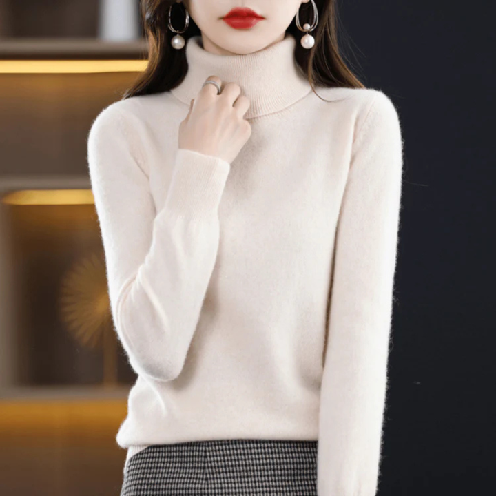Soft fine-knit women's turtleneck. Cozy long-sleeve top, perfect for versatile everyday fashion.