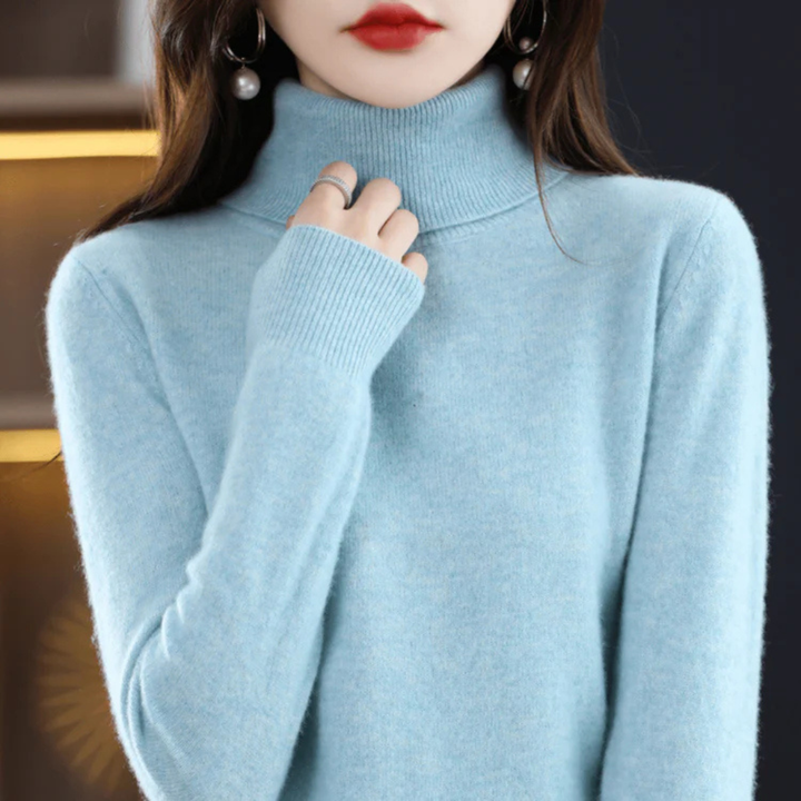 Chic women's fine-knit turtleneck sweater. Versatile layering top for comfortable everyday style.