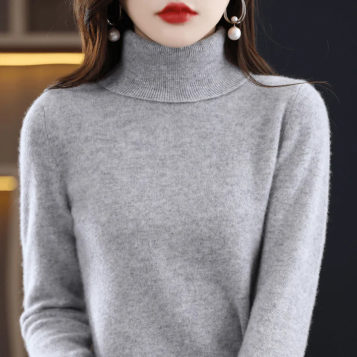 Chic fine-knit women's turtleneck sweater. Cozy long-sleeve layering top for everyday elegance.