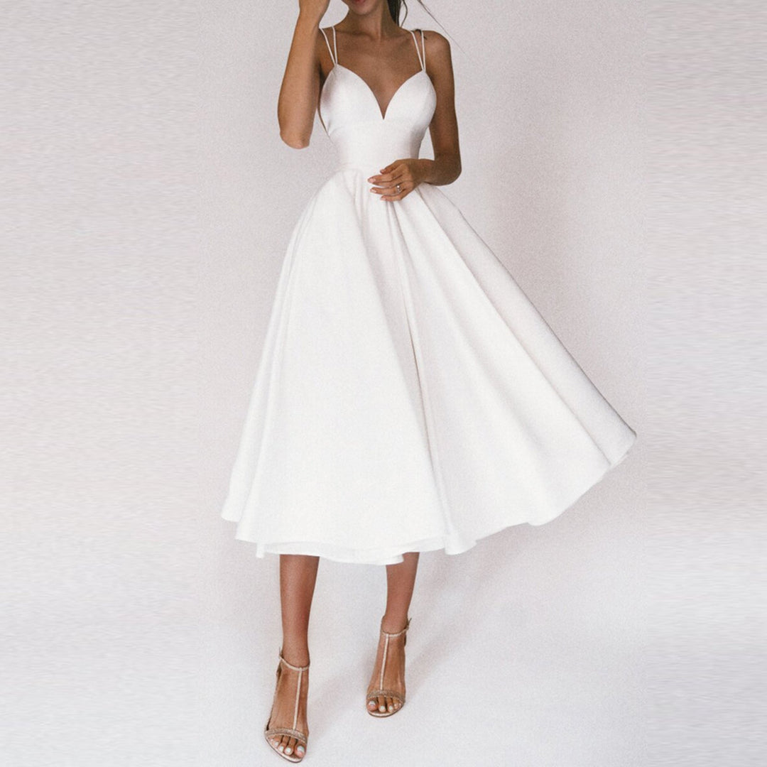 Women's Flared Midi Dress with Structured Bodice & Straps, perfect for elegant evening wear.