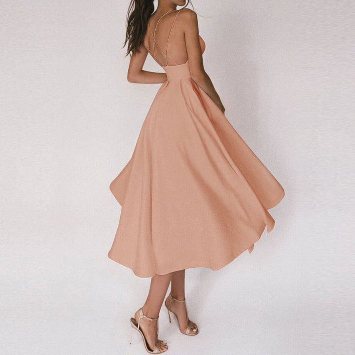 Stylish women's summer evening dress: flared midi with structured bodice, thin straps, ideal for special occasions.