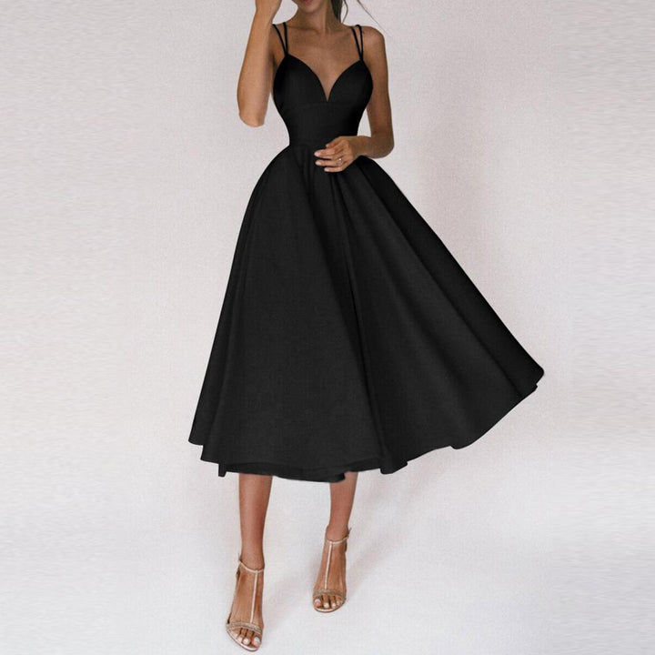 Formal women's flared midi dress, designed with a structured bodice and elegant shoulder straps for a sleek look.