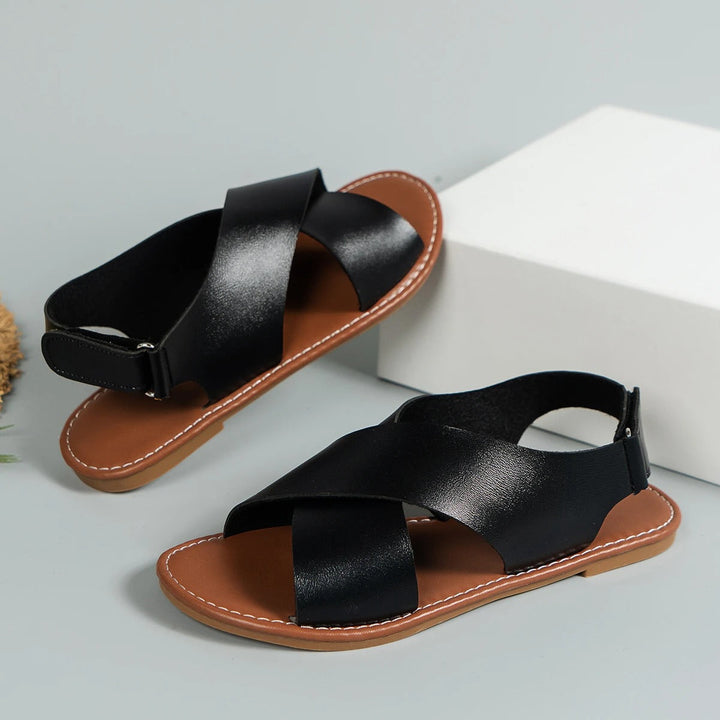 Women's casual buckle flat sandals offering all-day comfort, great for everyday wear and travel.
