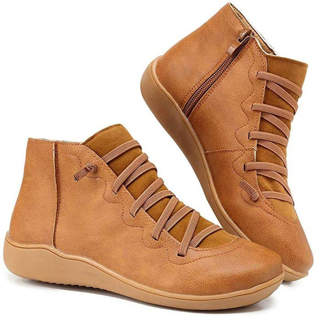 Women's flat lace-up ankle boots with convenient side-zip closure, ideal for everyday casual wear.