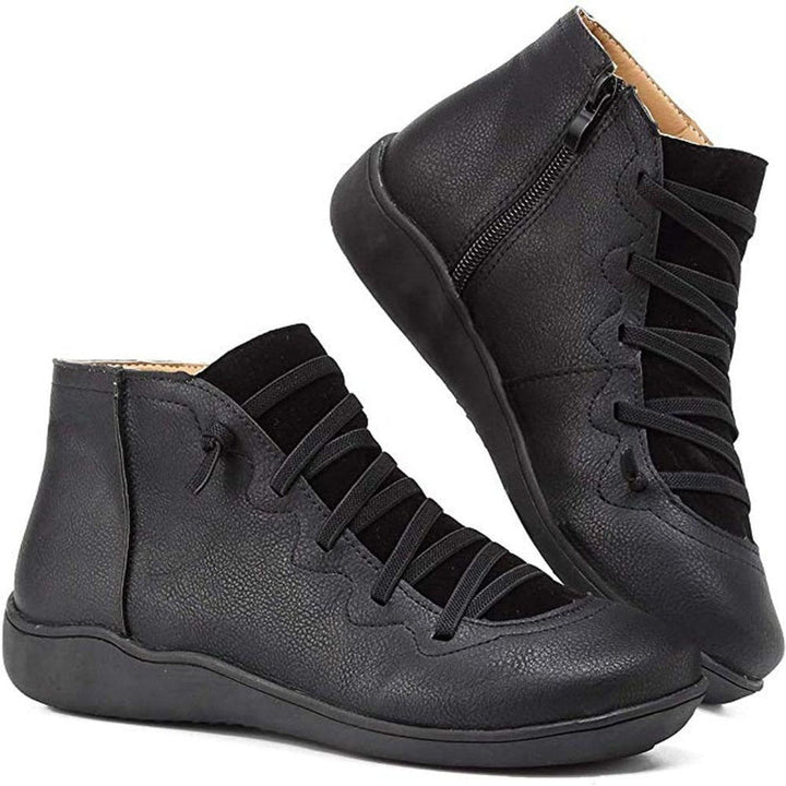 Chic women's flat lace-up ankle boots for versatile autumn and winter fashion, with easy side zip.