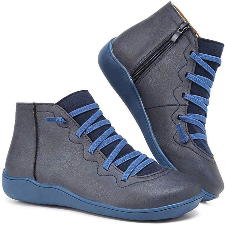 Stylish women's flat lace-up boots, designed for comfortable everyday wear, featuring a side zipper.