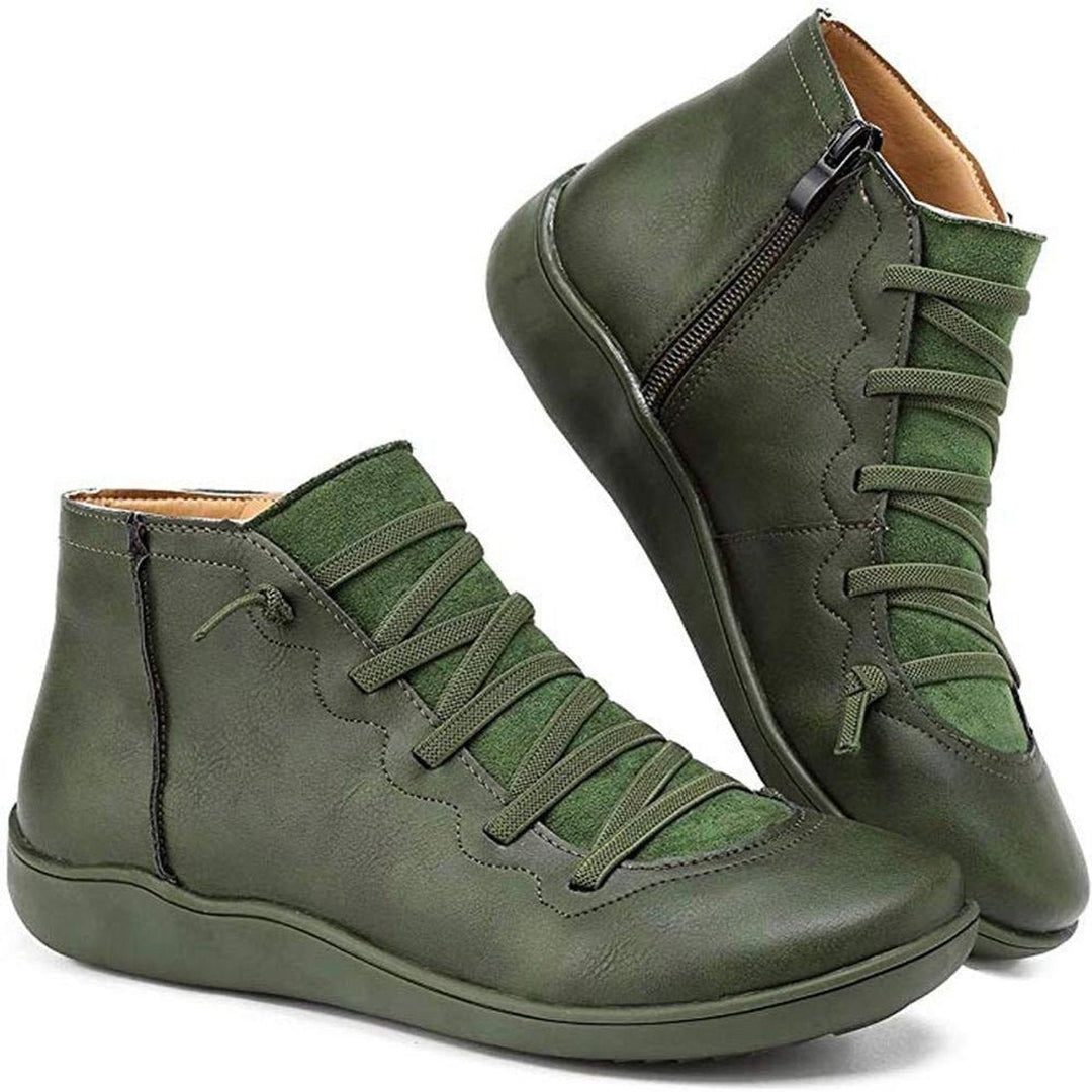Side view of women's flat lace-up ankle boots, perfect for casual outfits and autumn adventures.