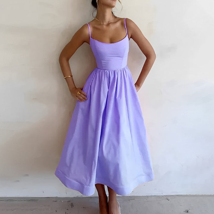 Chic women's A-line midi dress, ideal for comfortable summer fashion and elegant occasion wear.