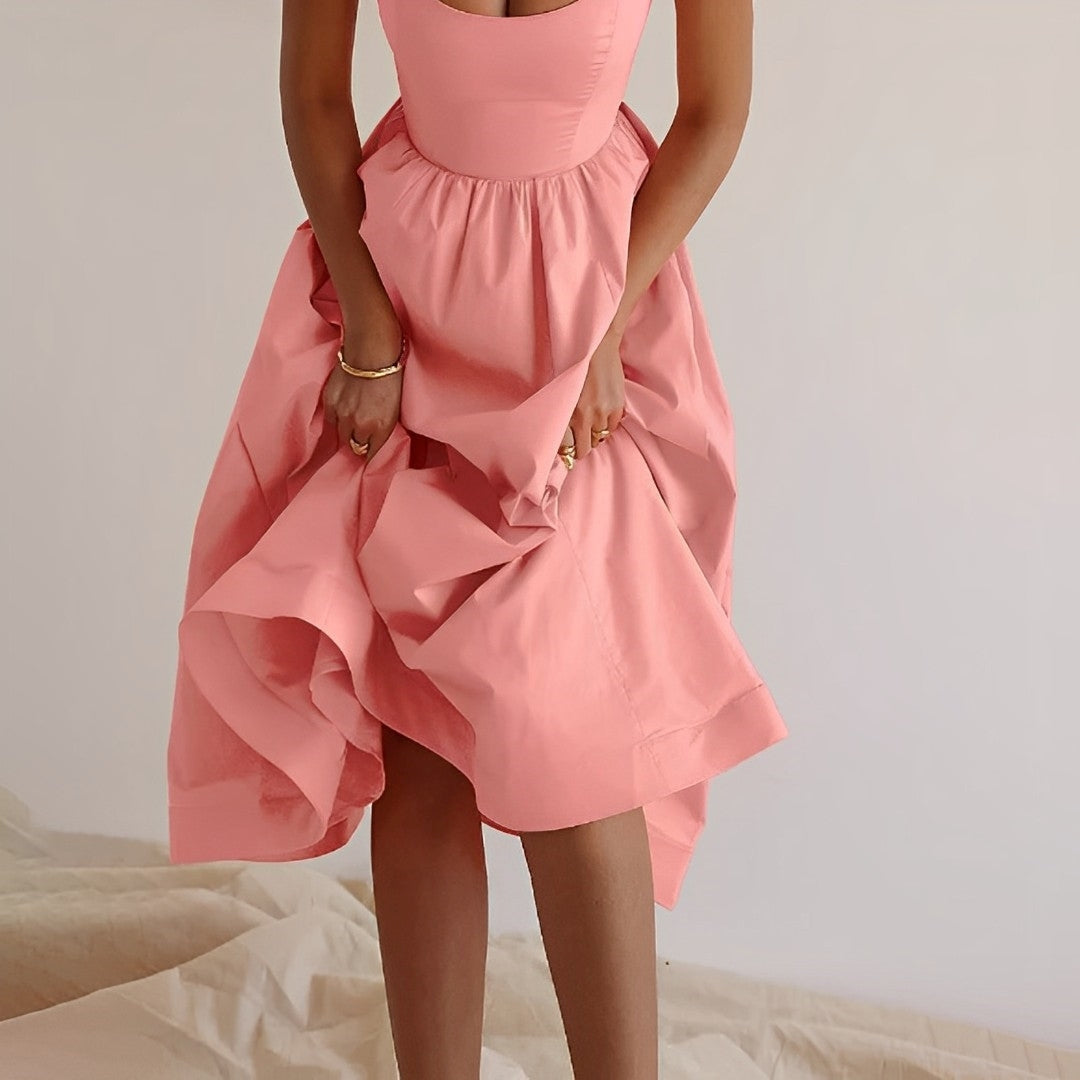 Women's versatile A-line midi dress, embodying effortless style, perfect for comfortable spring & summer fashion.