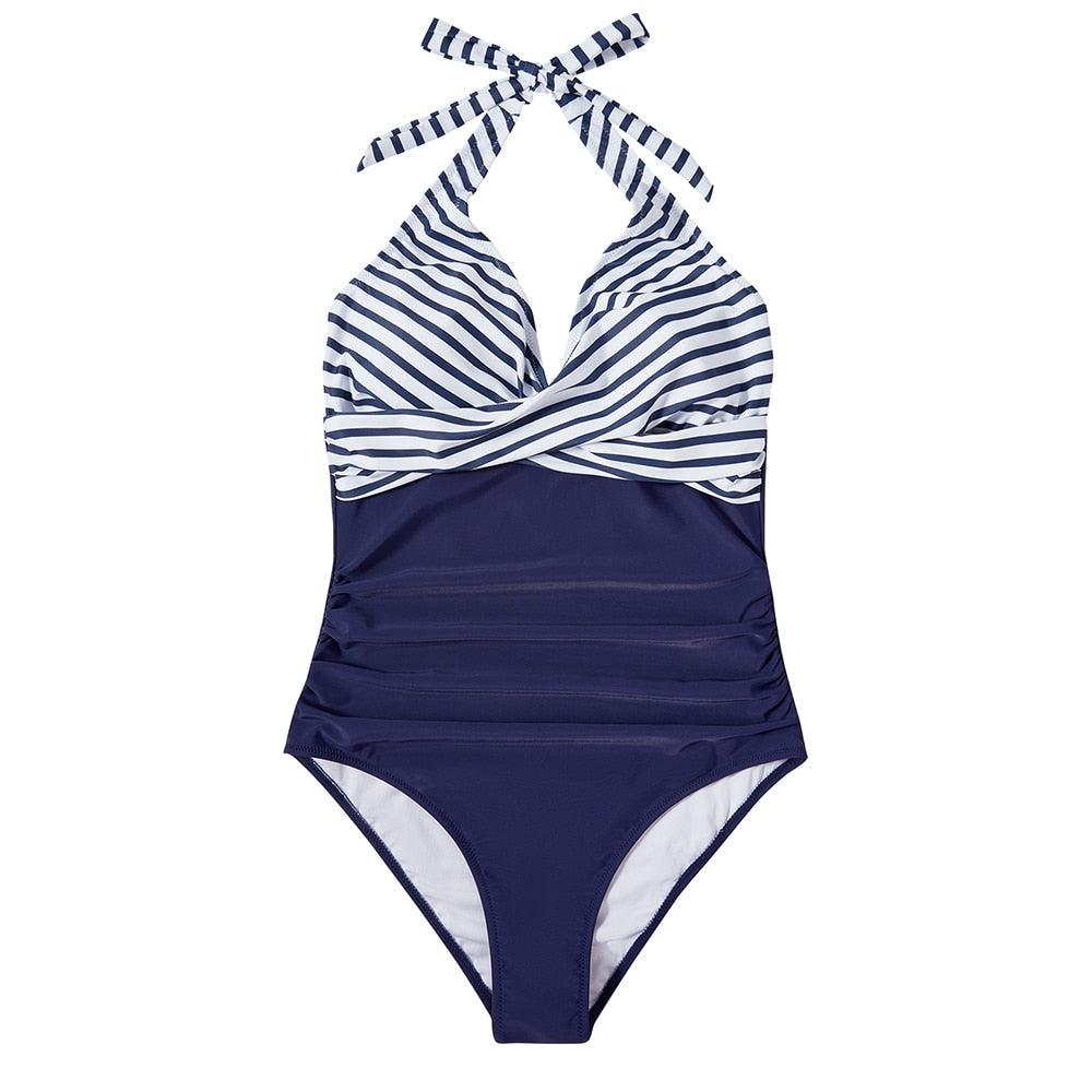 Confidence-boosting women's one-piece swimsuit with tummy control & flattering design for all body types.
