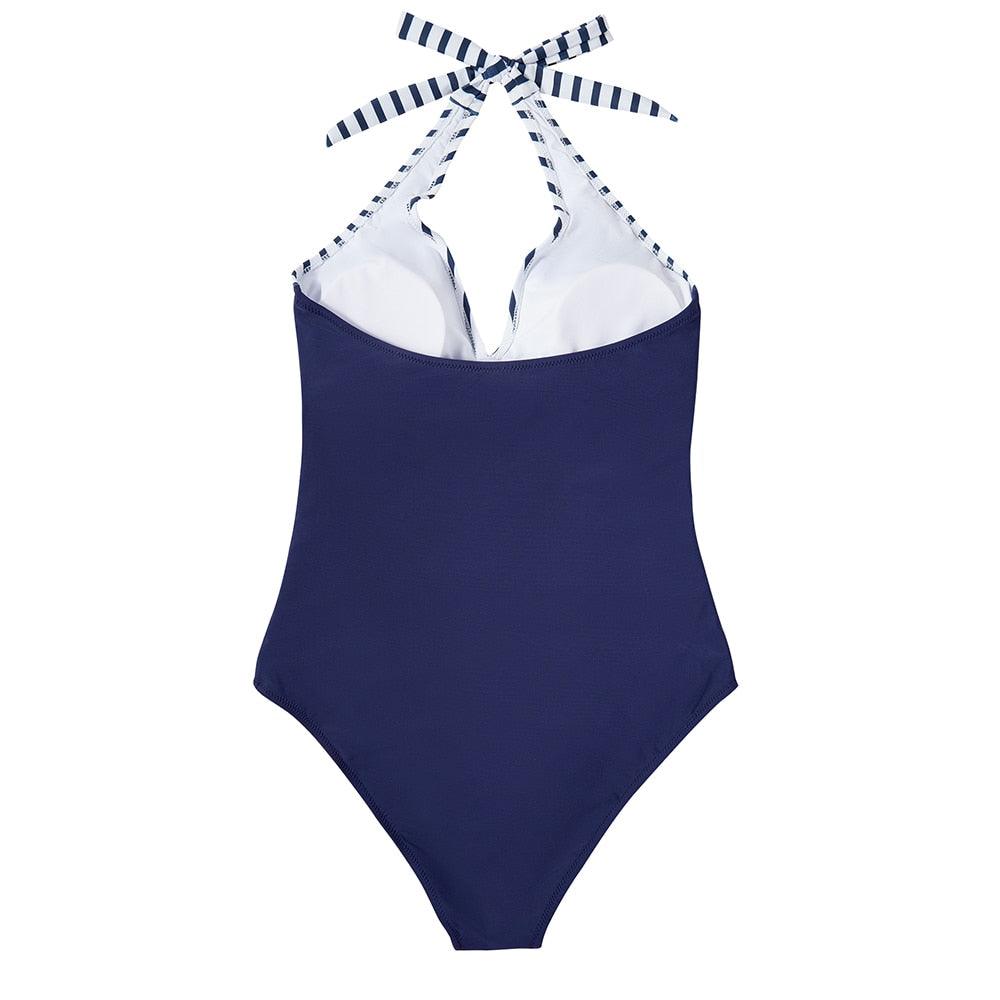 Women's flattering one-piece swimsuit, perfect for beach or poolside. Tummy control for comfort.