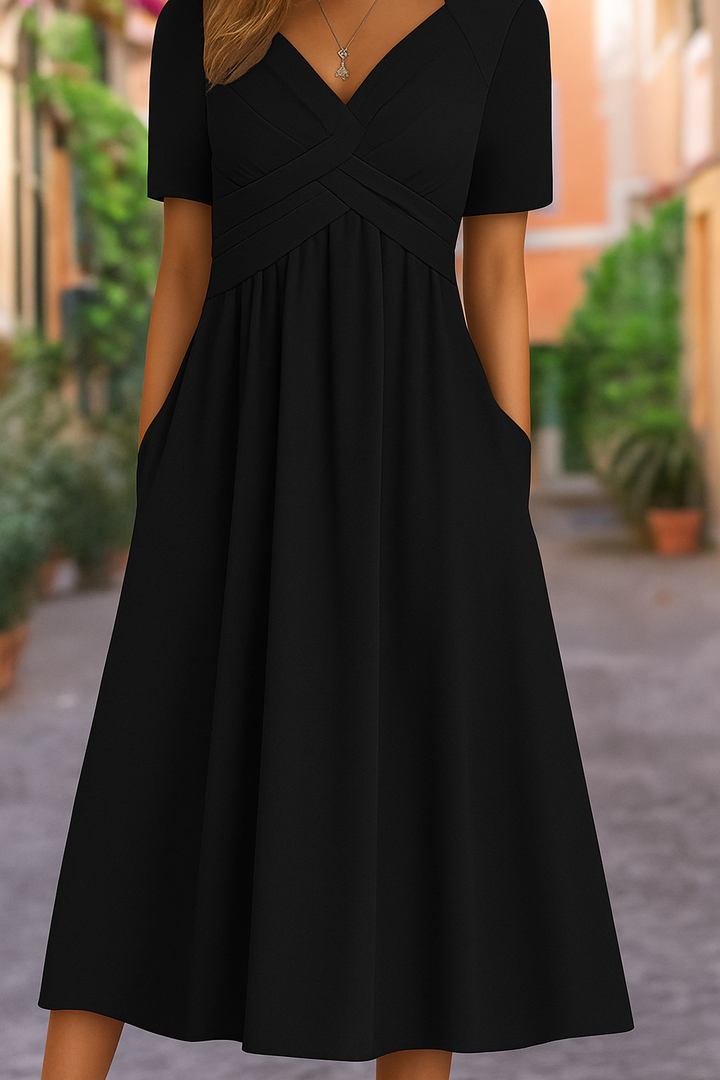 Women's versatile short-sleeve crossed dress, offering a flattering and comfortable fit for summer & day events.