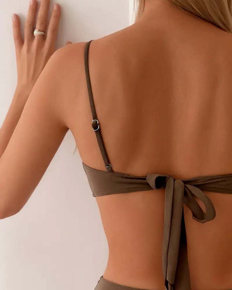 Adjustable brown women's bikini, a flattering two-piece swimsuit for comfortable beach style.