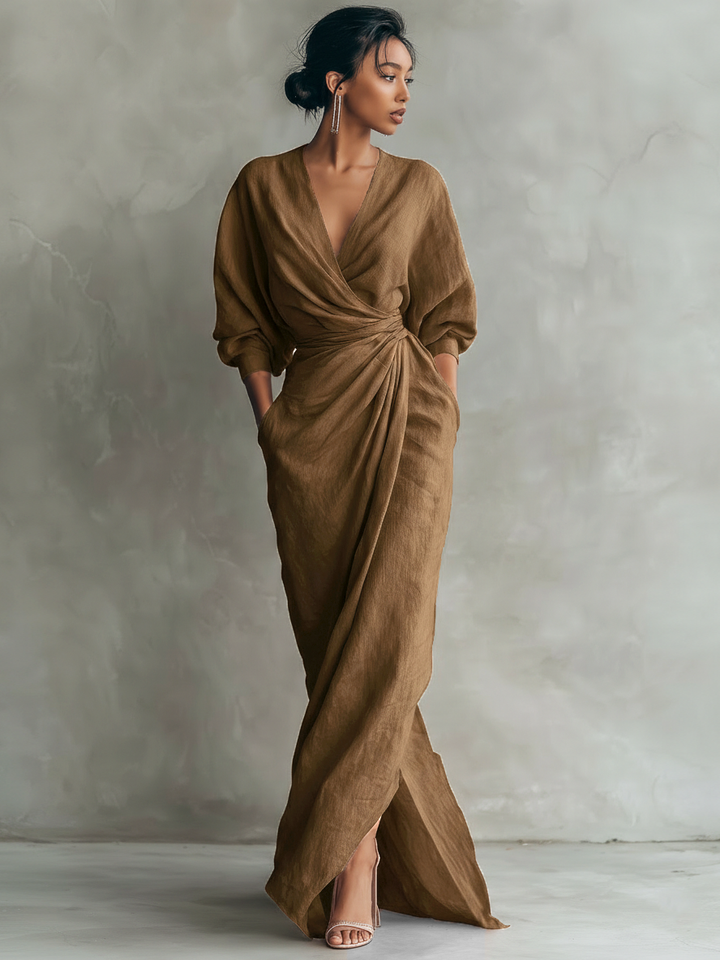 Stylish women's wrap maxi dress with a V-neck and three-quarter sleeves, perfect for spring and summer.