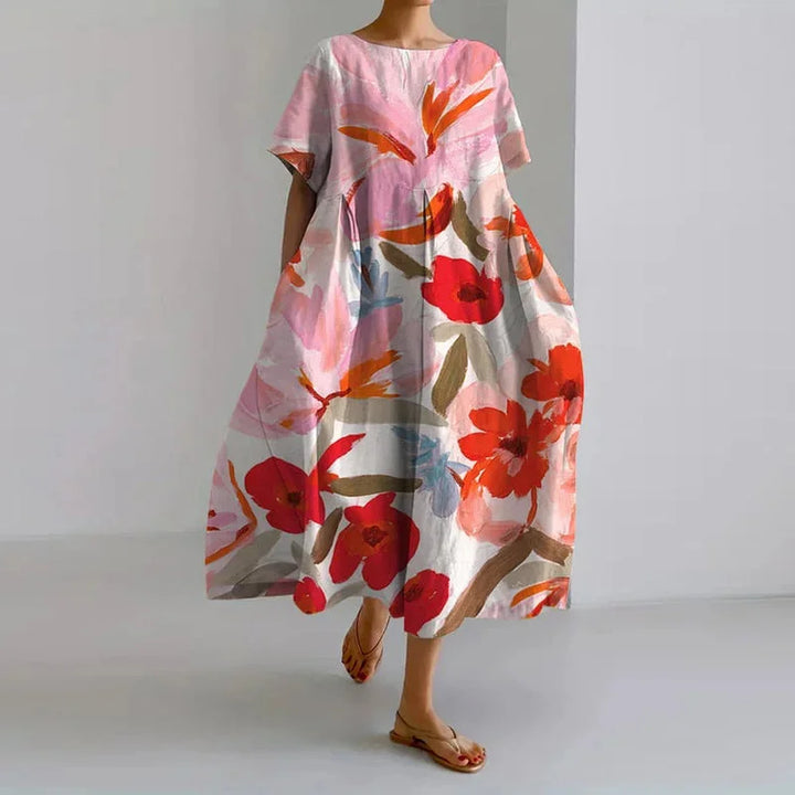 Feminine women's short-sleeve floral midi dress with an A-line silhouette & round neck, a stylish choice for summer casual.