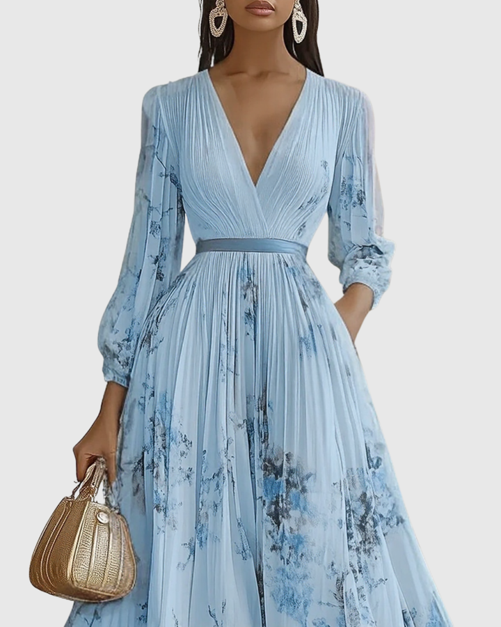 Beautiful floral print A-line sleeveless midi dress for women, offering a chic summer look.