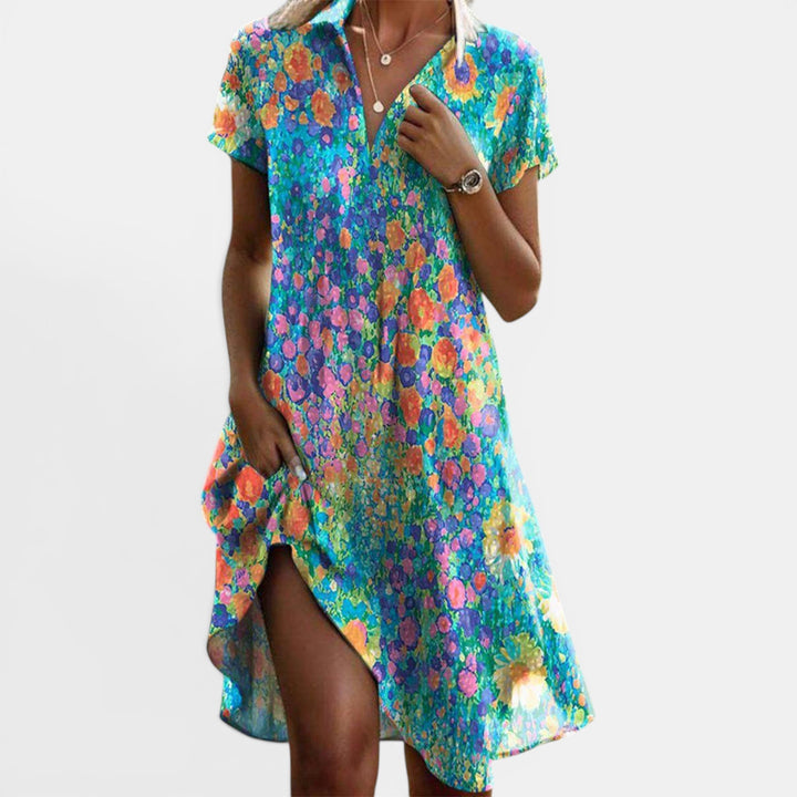 Women's floral boho maxi dress for summer. Lightweight, flowing fabric perfect for beach or casual wear.