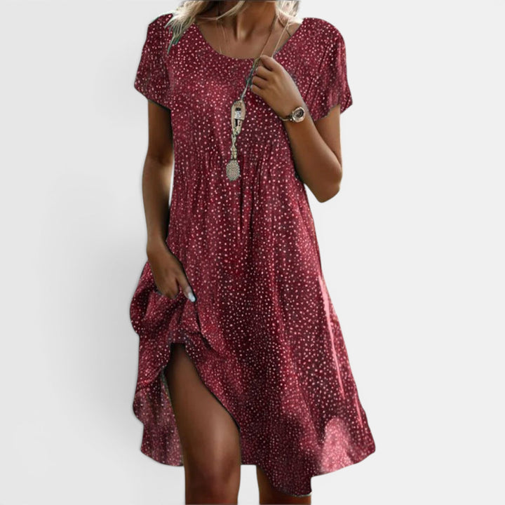 Elegant women's floral maxi dress, boho style. Ideal lightweight summer dress for vacation or beach outfits.
