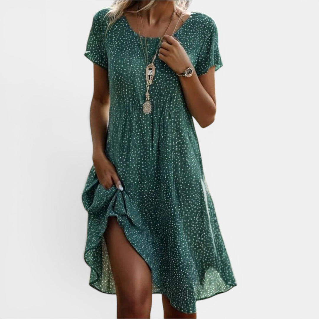 Comfortable women's flowing floral maxi dress. Lightweight boho summer style, perfect for everyday or vacation.