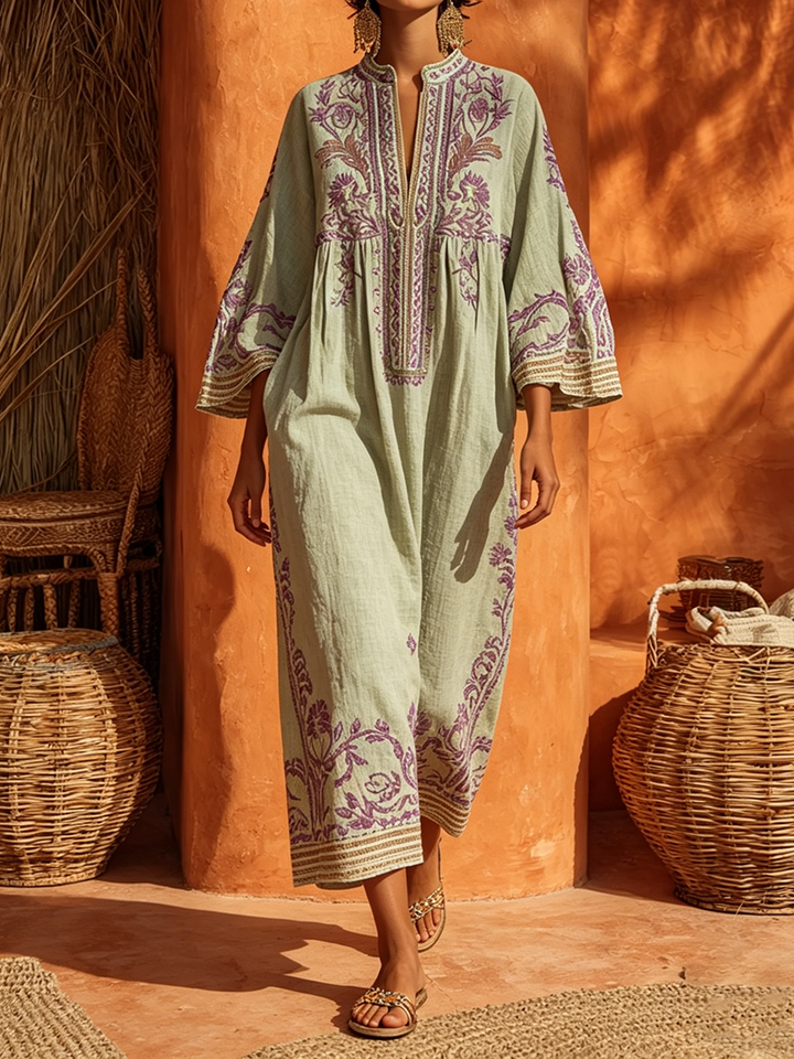 Women's floral boho maxi dress with mandarin collar & long sleeves, perfect for summer vacation.