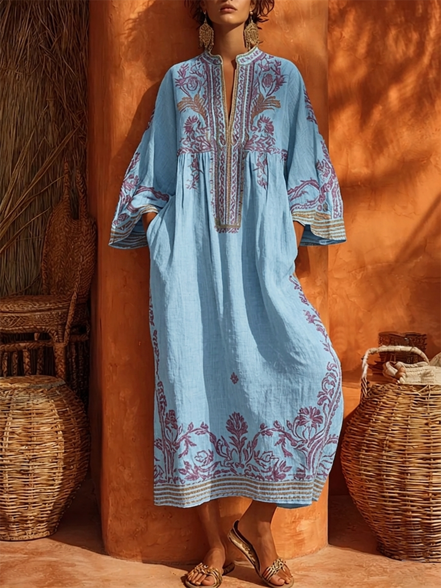 Women's fashion floral embroidered maxi dress, bohemian style with mandarin collar & long sleeves.