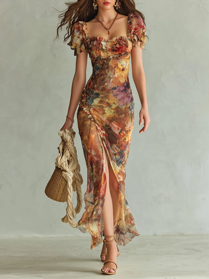 Women's floral boho maxi dress with ruffle details, sweetheart neckline & side slit. Perfect for summer events.