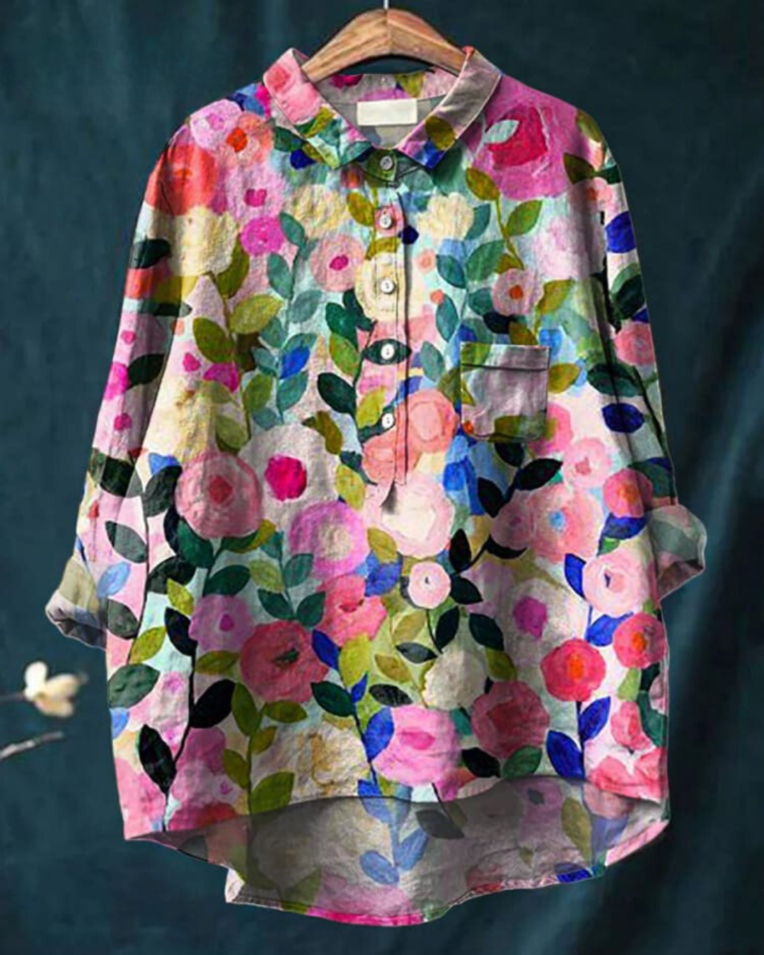 Women's floral button-up blouse with long sleeves, relaxed fit for casual or elegant wear. Perfect spring fashion.