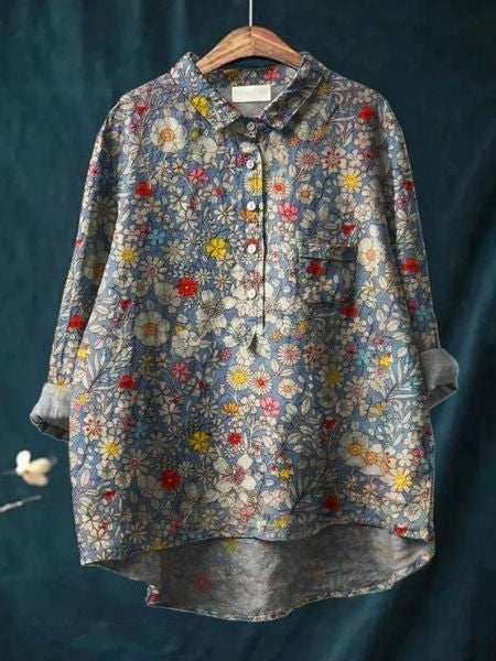 Women's spring fashion: floral button-up blouse. Relaxed fit, long sleeve, versatile for day or night.