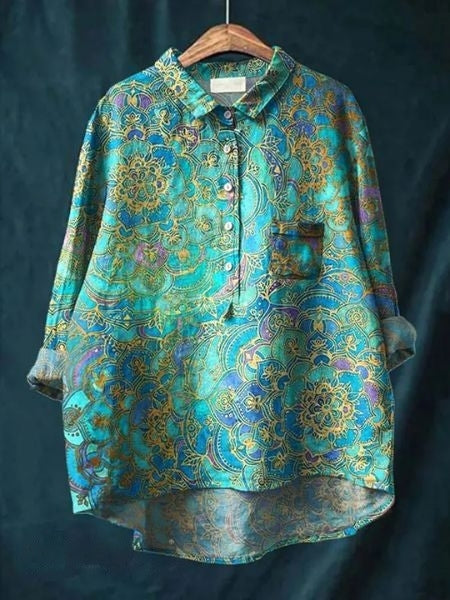 Back view of women's relaxed fit floral blouse. Long sleeve, button-up, perfect for spring fashion.