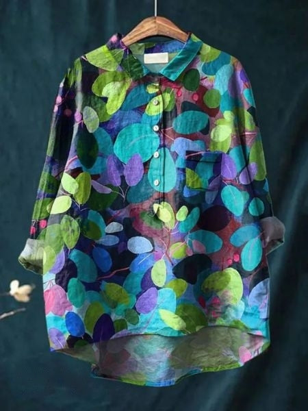 Elegant women's floral print button-up blouse. Long sleeve, relaxed fit for a comfortable, stylish look.