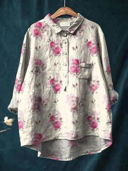 Casual women's floral button-up blouse with long sleeves, relaxed fit. A versatile top for any occasion.
