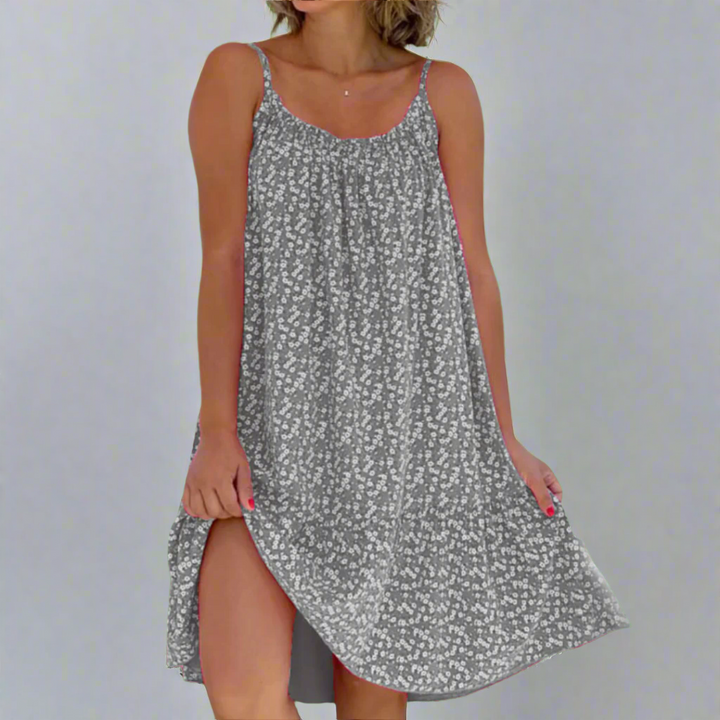 Vibrant floral print camisole mini dress for women. Ideal elegant summer dress or party wear.