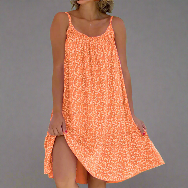 Stylish women's floral mini dress, a comfortable and elegant camisole for summer, vacation, or casual wear.