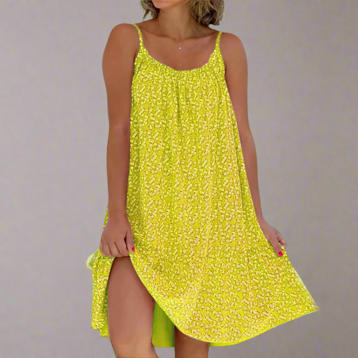 Flowy women's floral mini dress, a chic summer camisole for elegant, casual or party occasions.